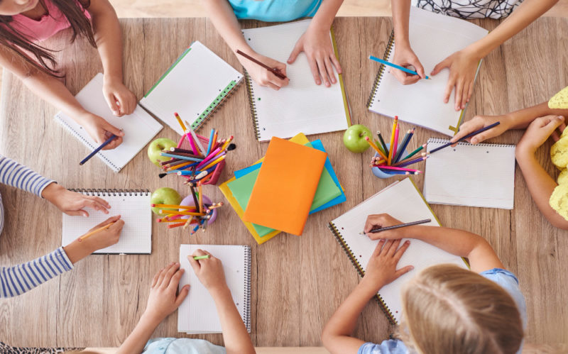 kids around school table